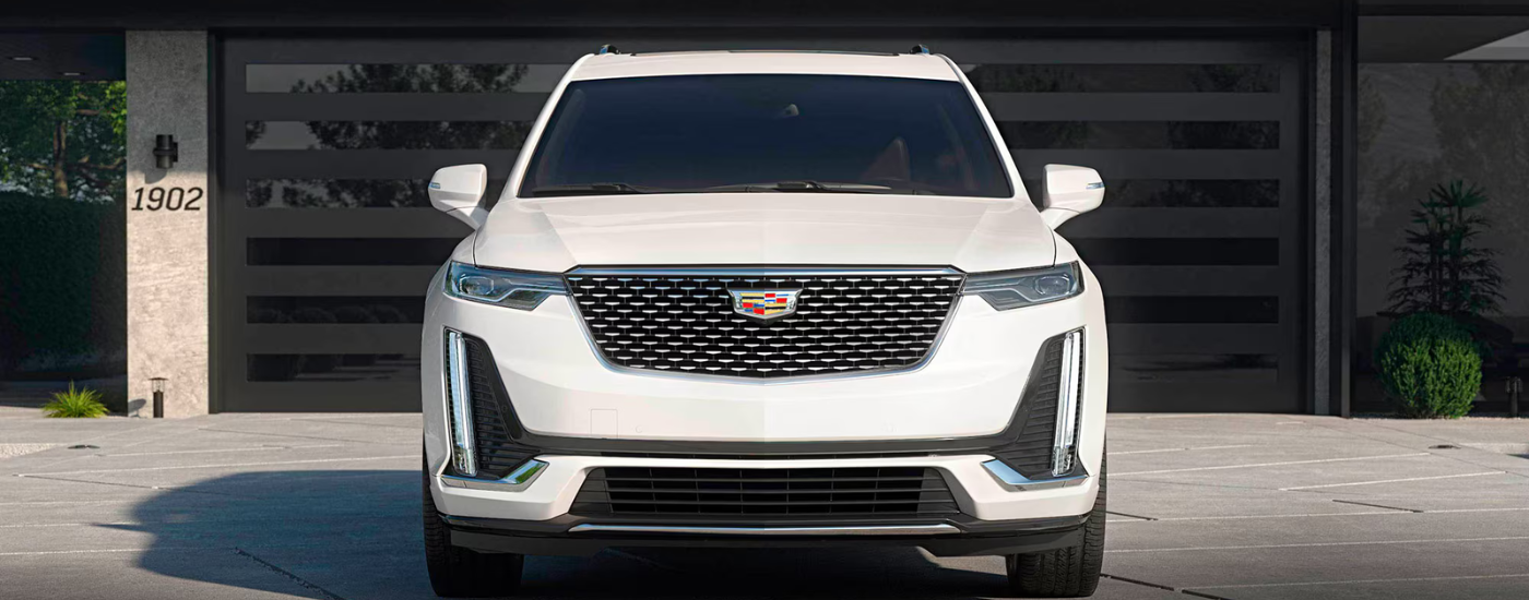 White 2026 Cadillac XT6 backed into a driveway