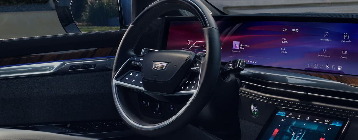 The front dashboard and infotainment touchscreen on a 2026 Cadillac Escalade.