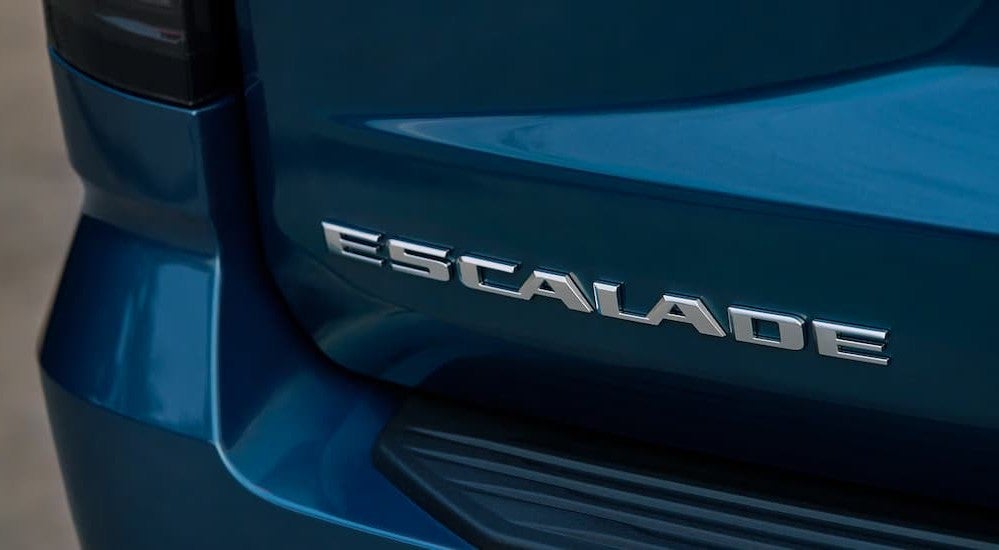 Escalade badge on a blue 2027 Cadillac escalade.